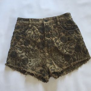 Free People distressed embroidered denim shorts